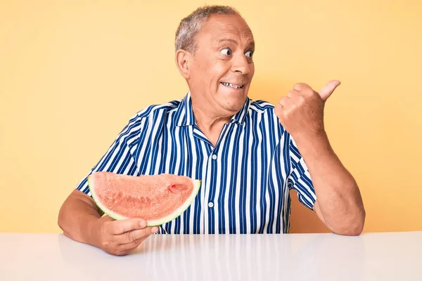 Senior Handsome Man Gray Hair Eating Sweet Watermelon Slice Pointing — Stock Photo, Image