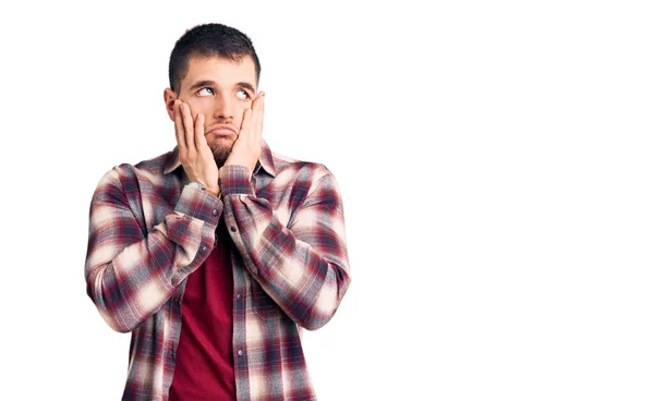 Jovem Homem Bonito Vestindo Camisa Casual Cansado Mãos Cobrindo Rosto — Fotografia de Stock