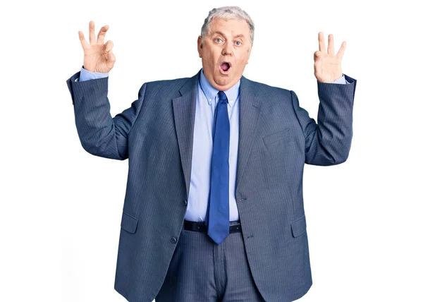 Senior Grey Haired Man Wearing Business Jacket Looking Surprised Shocked — Stock Photo, Image