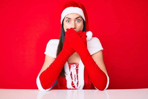 Young Caucasian Woman Wearing Santa Claus Costume Shocked Covering Mouth — Stock Photo, Image