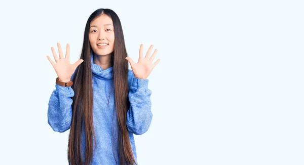 Young Beautiful Chinese Woman Wearing Casual Turtleneck Sweater Showing Pointing — Stock Photo, Image