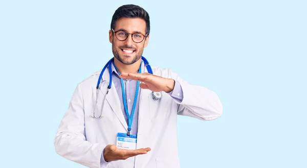 Young Hispanic Man Wearing Doctor Uniform Stethoscope Gesturing Hands Showing — Stock Photo, Image