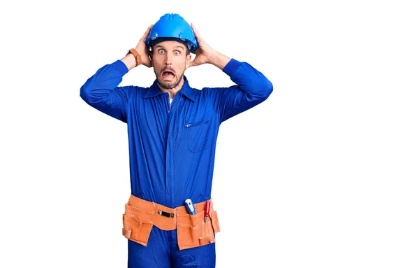 Jovem Homem Bonito Vestindo Uniforme Trabalhador Chapéu Duro Cético Nervoso — Fotografia de Stock