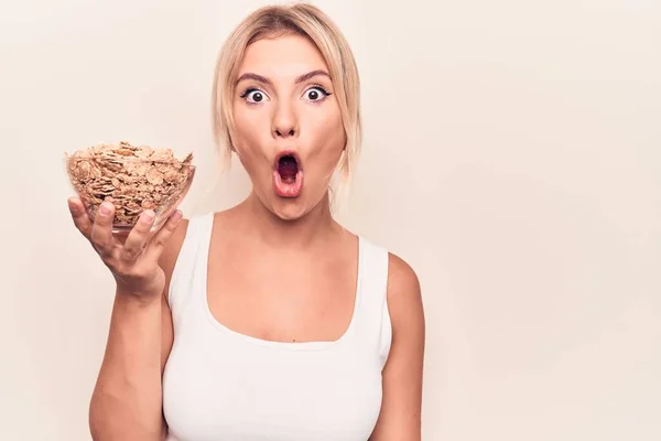 Young Beautiful Blonde Woman Holding Bowl Conrflakes Cerals White Background — Stock Photo, Image