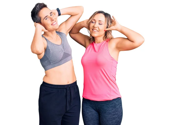 Couple Women Wearing Sportswear Relaxing Stretching Arms Hands Head Neck — Stock Photo, Image