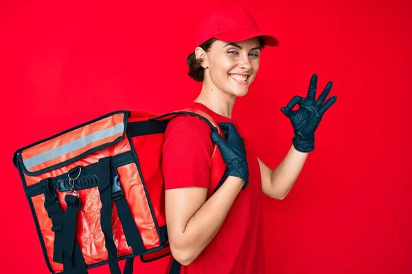 Young Hispanic Woman Holding Take Away Backpack Doing Sign Fingers — Stock Photo, Image