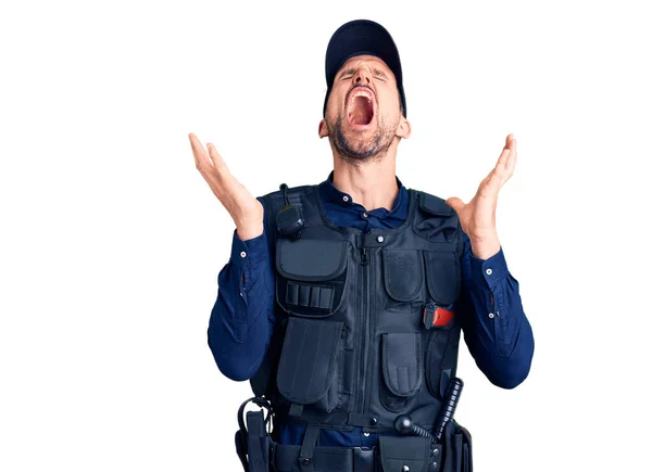 Joven Hombre Guapo Vistiendo Uniforme Policía Celebrando Loco Loco Por —  Fotos de Stock