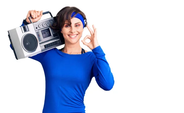 Beautiful Young Woman Short Hair Wearing Workout Clothes Holding Boombox — Stock Photo, Image