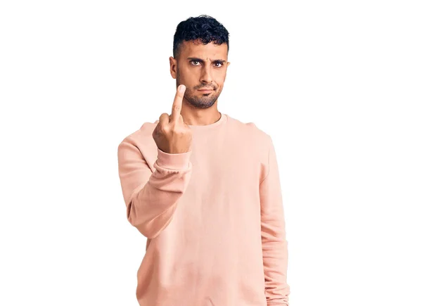 Young Hispanic Man Wearing Casual Clothes Showing Middle Finger Impolite — Stock Fotó