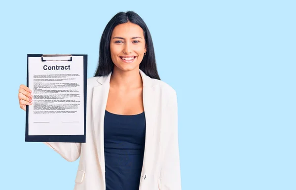 Young Beautiful Latin Girl Holding Clipboard Contract Document Looking Positive — Stock Photo, Image