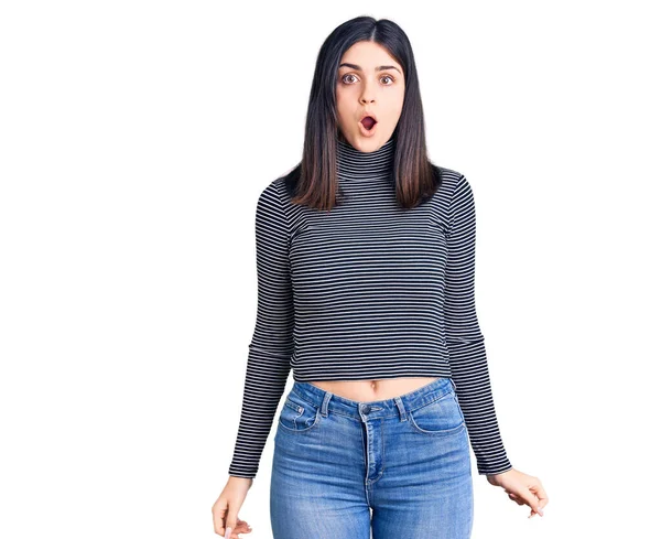 Young Beautiful Girl Wearing Striped Shirt Scared Amazed Open Mouth — Stock Photo, Image