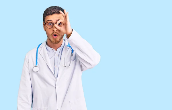 Handsome Young Man Bear Wearing Doctor Uniform Doing Gesture Shocked — Stock Photo, Image
