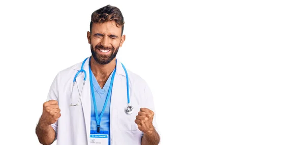 Young Hispanic Man Wearing Doctor Uniform Stethoscope Excited Success Arms — Stock Photo, Image