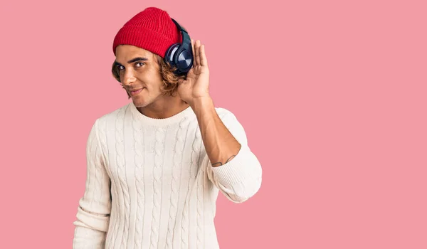 Young Hispanic Man Listening Music Using Headphones Smiling Hand Ear — Stock Photo, Image