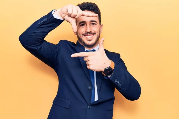 Young Hispanic Man Wearing Suit Smiling Making Frame Hands Fingers — Stock Photo, Image