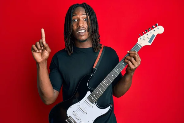 African American Man Braids Playing Electric Guitar Surprised Idea Question — Stock Photo, Image
