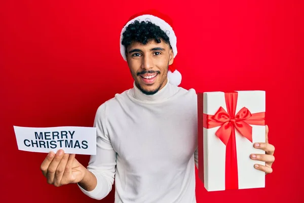 Ung Arabisk Stilig Man Bär Jul Hatt Hålla God Jul — Stockfoto