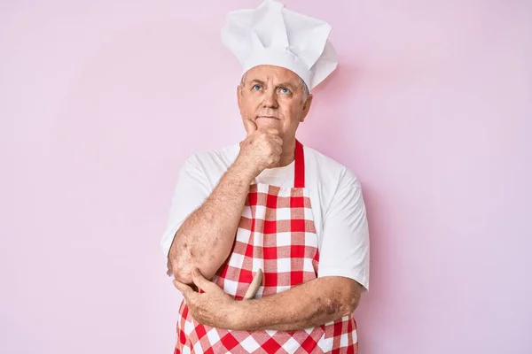 Senior Grey Haired Man Wearing Professional Baker Apron Hand Chin — Stock Photo, Image