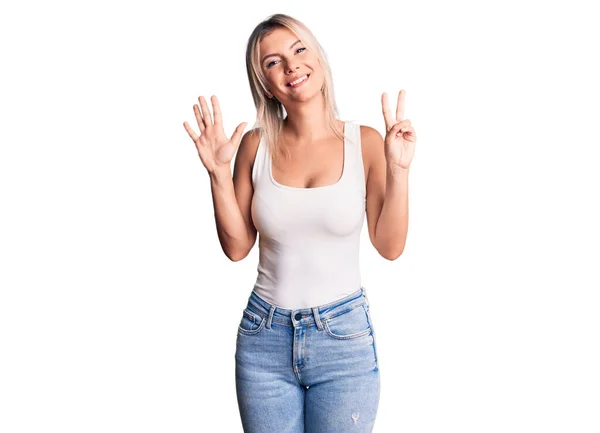 Young Beautiful Blonde Woman Wearing Casual Sleeveless Shirt Showing Pointing — Stock Photo, Image