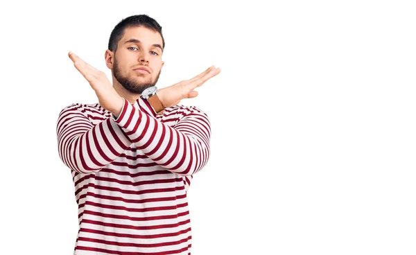 Young Handsome Man Wearing Striped Sweater Rejection Expression Crossing Arms — Stock Photo, Image