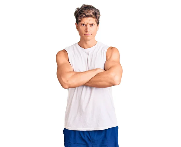Jovem Homem Bonito Vestindo Camiseta Sem Mangas Cético Nervoso Desaprovando — Fotografia de Stock