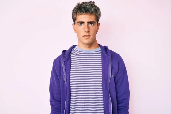 Young Handsome Man Wearing Casual Purple Sweatshirt Serious Expression Face — Stock Photo, Image