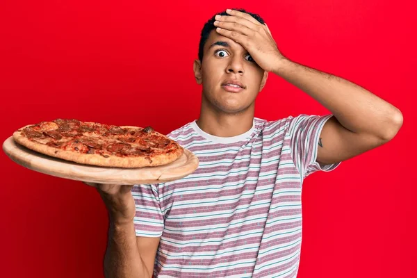 Young Arab Man Holding Italian Pizza Stressed Frustrated Hand Head — Stock Photo, Image