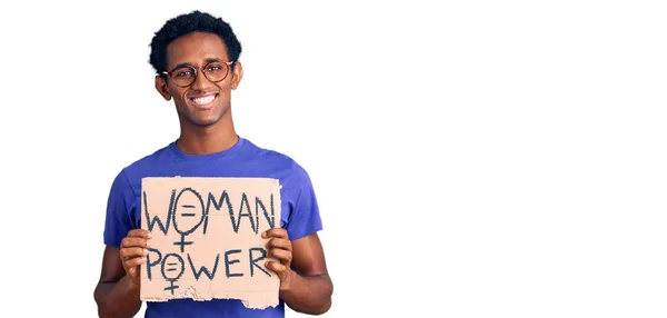 African Handsome Man Holding Woman Power Banner Looking Positive Happy — Stock Photo, Image