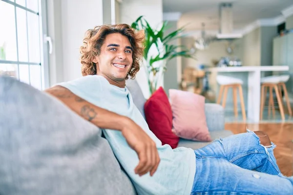 Young Hispanic Man Smiling Happy Sitting Sofa Home — Stock Photo, Image