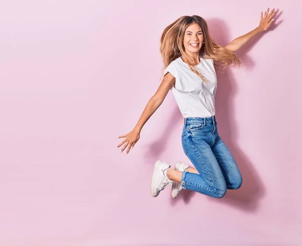 Young Beautiful Woman Wearing Casual Clothes Smiling Happy Jumping Smile — Stock Photo, Image