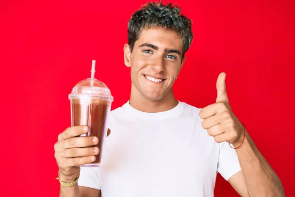 Young Handsome Man Holding Glass Smoothie Smiling Happy Positive Thumb — Stock Photo, Image