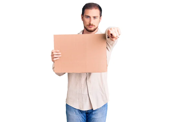Young Handsome Caucasian Man Holding Empty Cardboard Banner Pointing Finger — Stock Photo, Image
