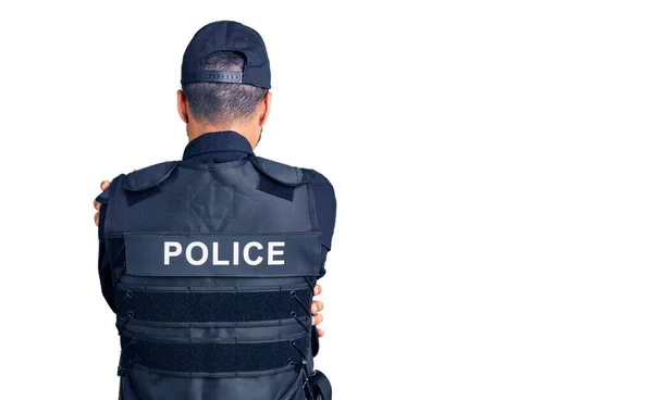 Young Hispanic Man Wearing Police Uniform Hugging Oneself Happy Positive — Stock Photo, Image
