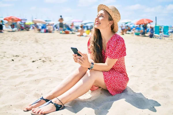 Young Blonde Woman Vacation Using Smartphone Sitting Sand Beach — Stock Photo, Image