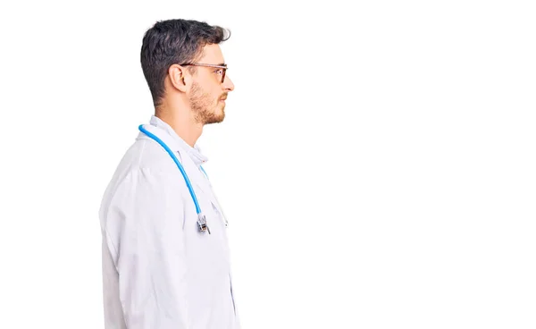 Handsome Young Man Bear Wearing Doctor Uniform Looking Side Relax — Stock Photo, Image