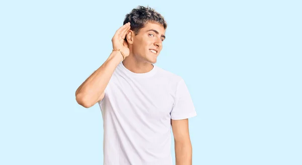 Young Handsome Man Wearing Casual White Tshirt Smiling Hand Ear — Stock Photo, Image