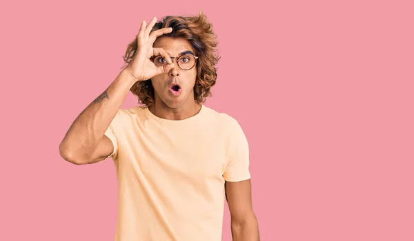 Young Hispanic Man Wearing Casual Clothes Glasses Doing Gesture Shocked — Stock Photo, Image