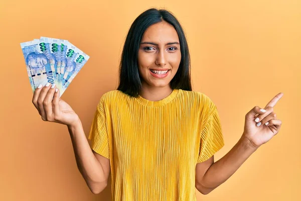 Young Brunette Woman Holding South African 100 Rand Banknotes Smiling — Stock Photo, Image