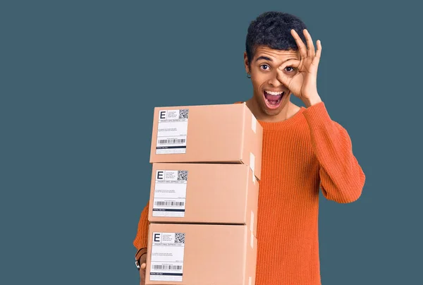 Young African Amercian Man Holding Delivery Package Smiling Happy Doing — Stock Photo, Image