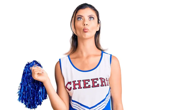 Young Beautiful Woman Wearing Cheerleader Uniform Making Fish Face Lips — Stock Photo, Image