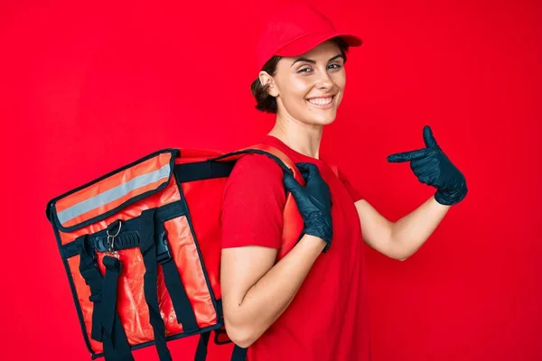 Young Hispanic Woman Holding Take Away Backpack Pointing Finger One — Stock Photo, Image