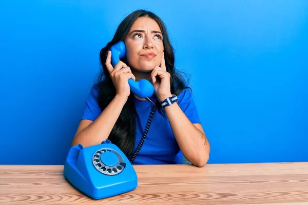 Beautiful Brunette Young Woman Speaking Vintage Telephone Serious Face Thinking — Stock Photo, Image