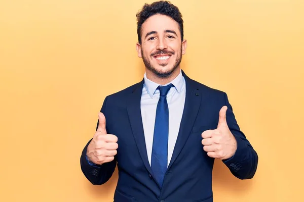 Young Hispanic Man Wearing Suit Success Sign Doing Positive Gesture — Stock Photo, Image