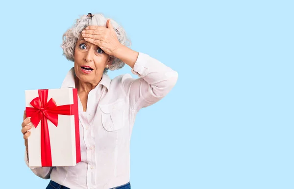 Senior Grey Haired Woman Holding Gift Stressed Frustrated Hand Head — Stock Photo, Image