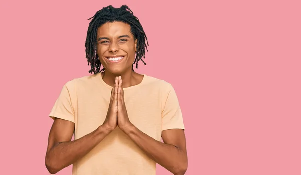 Young African American Man Wearing Casual Clothes Praying Hands Together — Stock Photo, Image