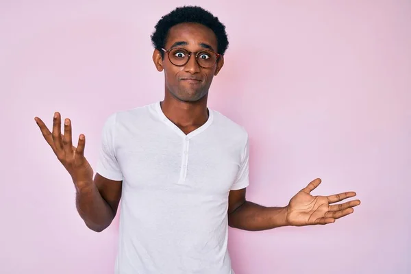 African Handsome Man Wearing Casual Clothes Glasses Clueless Confused Expression — Stock Photo, Image