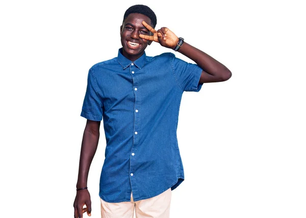 Young African American Man Wearing Casual Clothes Doing Peace Symbol — Stock Photo, Image