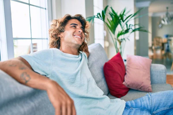 Young Hispanic Man Smiling Happy Sitting Sofa Home — Stock Photo, Image