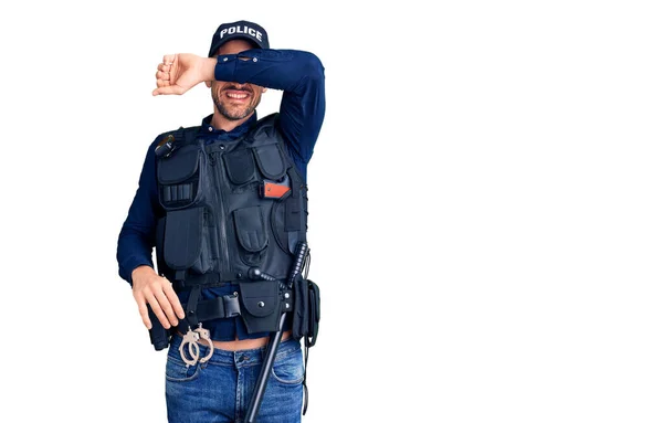 Young Handsome Man Wearing Police Uniform Covering Eyes Arm Smiling — Stock Photo, Image