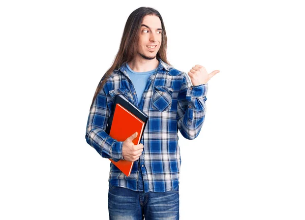 Joven Hombre Adulto Con Pelo Largo Sosteniendo Collage Libro Apuntando — Foto de Stock